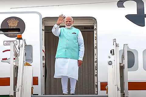 PM Modi emplanes for Russia